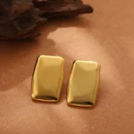 Orecchini rettangolari grandi in acciaio dorato - immagine 5