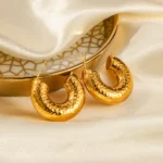 Orecchini a cerchio grossi in acciaio inox martellato - immagine 2