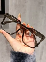 Occhiali geometrici eleganti con lenti trasparenti - immagine 5